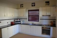  19 Bennett Street Inverell NSW 2360  FOR SALE: $215,000  Property Description Motivated Vendors! This well presented home is an opportunity not to be missed! 2 spacious b/rs, sleepout & office, ideal for owner occupiers or investors alike with a current rental income of $280 p/w. Features include a modern kitchen with stainless steel appliances, spacious living with gas heating, decorative high ceilings, large laundry & tidy bathroom. Covered entertaining area with 2nd toilet, 7 × 7 m shed with power & attached skillion, garden shed, 2 × 3m dog kennel, colorbond fencing with feature gate, low maintenance gardens & 1012 m2 block with privacy. Conveniently located to store, schools, clubs & sporting fields. whether nesting or investing this is a fantastic home! Vendors instructions are to GET IT SOLD. Property Features Land Area 	 1,012.0 sqm 