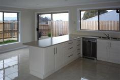  4/11-13 Edith Court Legana TAS 7277 LEGANA GROVE ESTATE Large New Unit! Superb large new unit situated close to shopping complex.  Extra large living areas plus beautiful kitchen with soft close drawers and cupboards and Westinghouse appliances including wall oven and dishwasher. Reverse cycle heating and cooling (heat-pump). Main bedroom with direct access to the bathroom. Garaging with remote control door and access to inside. Fully landscaped and low maintenance. Wheelchair friendly. Purchaser gets to choose the carpet. This new home qualifies for the Tasmanian Government "FIRST HOME BUYERS $30,000 GRANT".  How to get there: Freshwater Point Road into Brigalow Street into Edith Court. General Features Property Type: Unit Bedrooms: 2 Bathrooms: 1 Building Size: 163.79 m² (18 squares) approx Outdoor Features Garage Spaces: 1 Offers Over $290,000 