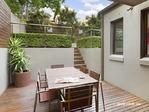  51 Francis St Leichhardt NSW 2040 Generous proportions and bright natural light, define this 
well-designed, freestanding residence situated in a wide, tree-lined 
street moments from Norton Street village and Leichhardt North Light 
Rail station. Spanning two levels, the house has large bedrooms, two 
living areas, alfresco entertainment zones, solar hot water and direct 
access from a secure garage 
 
Large living and dining areas with a seamless flow to a timber decked 
alfresco dining/BBQ courtyard and sunny landscaped garden with level 
lawn 
 
Spacious CaesarStone kitchen with live 5 burner gas range, stainless 
steel range hood, Bosch dishwasher, glass splash backs and pretty garden
 outlook 
 
Sitting room with bespoke cabinetry and library shelving, excellent 
design features include ceiling shadow lines and glass louvres for 
cross-flow ventilation 
 
Downstairs bathroom with frameless glass shower and Caesarstone vanity 
 
Big separate laundry with storage cupboards; another storage area under the stairs 
 
King-size master bedroom has big built-in wardrobe (with pull-down 
double hanging rails), sleek ensuite and balcony overlooking the back 
garden 
 
Two more double bedrooms, both with built-in robes, one with a balcony; 
4th bedroom or study with built-ins, cabinetry, shelves and skylight 
 
Upstairs bathroom features floor-to-ceiling tiles, deep bath and 
separate shower; upstairs hallway with custom-designed cabinet and 
uplighting 
 
Design features include bespoke curtains, pendant lights, custom 
cabinetry, quality carpet, polished hardwood timber floors and glass 
louvres 
 