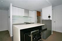  Unit 805/181 St Kilda Road, St Kilda VIC 3182 njoy every luxury you deserve in this sparkling designer fully furnished two bedroom, 8th floor apartment with sweeping views across the city and Melbourne landscape. Comprising: Elegant security entrance, lifts, entry foyer, spacious open plan living/dining, with integrated air conditioning, adjoining extra-large wraparound sun balcony, Caesar stone kitchen with breakfast bar, dishwasher, stainless steel fridge & appliances. two double bedrooms with built-in robes, master including fully tiled ensuite, second bathroom containing shower and laundry facilities. Note: A secure remote basement carpark and huge adjoining storage cage is on title. 