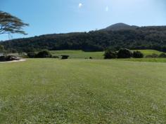  194 Gray Road Green Hill Qld 4865 33 Acres of Untouched Paradise just 20 minutes to the City As
 soon as I walked onto this property my mind went into a complete calm 
and I could think of nothing else but the vista in front of me. The 
green rolling hills blending into the rainforest on the outskirts, the 
fenced paddocks with sheds built waiting for the horses and the creek 
meandering through the middle. Little did I know it but there were 
still many more surprises all hidden away. We entered the 
rainforest which is national parkland, completely untouched and a whole 
new world. Wandering through I felt privileged as I am sure not many 
people would ever get the chance to experience the sheer beauty of this 
untouched world. The creeks running through all turned and twisted 
heading in different directions but each one more picturesque than the 
next. The huge trees had those trunks that are wide and sleek and you 
cannot help but appreciate their lines. The higher you go the more 
beautiful it is. Back into the land stretching in front of us we 
then drove to a higher area which gave a whole different perspective on 
the landscape and quite literally took my breath away. This would be 
the perfect place if someone wanted to build a new home or possibly a ... show more View Sold Properties for this Location View Auction Results 