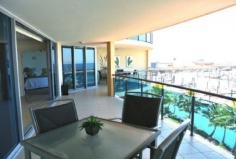  Mulherin Dr Mackay Harbour QLD 4740 There is nothing more prestigious than Puerto Galera. For the discerning few who seek the very best, we offer this beautifully appointed luxury penthouse style apartment for sale. On entering, the floor to ceiling glass captures one of the most spectacular views sweeping across the marina and beyond to the scenic beach. You will be immediately aware of the generous open floor plan maximising space, natural light and ventilation and how every room is so luxuriously appointed. A chic style is achieved with marble, granite, and the fine finishes denote elegantly casual living. With clever design maximizing internal space, this home has balconies flowing from all rooms. The spacious master bedroom enjoys an enormous private marble en-suite, with separate toilet and walk in robe room. Price: $1,375,000 