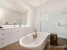  133 Canterbury Road Middle Park VIC 3206 "Wansley" Captivating Residence With Unique Separate Tower Apartment A magnificent and unique landmark property “Wansley” boasts a captivating combination of c.1890 Victorian grace and sophisticated architect designed contemporary space. This stylish home with a four bedroom floor plan on 370sqm (approx) also features an adjoining c.1926 unique tower apartment. Behind its stunning heritage facade, an exquisite lead light entry and grand arched hallway introduce formal sitting and dining rooms filled with the personality of handsome marble open fireplaces and soaring ceilings. Beyond, an integrated marble kitchen with Smeg appliances serves light drenched open plan spaces extending to landscaped outdoor zones that include a solar/gas heated pool, shaded alfresco entertaining domains and remote garage via Canterbury Place. Upstairs, a deluxe main bedroom enjoys its own zone with open fire, verandah access, extensive built in and fitted walk in robes and palatial bathroom with freestanding bath and fireplace. In a separate wing, three further double bedrooms feature built in robes/ desks. Complements include hydronic heating, ducted cooling, abundant built in storage. The unique separate tower apartment which is flexible as further accommodation, a ... show more View Sold Properties for this Location View Auction Results General Features Property Type: House Bedrooms: 6 Bathrooms: 3 Indoor Features Toilets: 5 Air Conditioning Outdoor Features Garage Spaces: 1 Swimming Pool - Inground Other Features Built-In Wardrobes,Close to Schools,Close to Shops,Close to Transport,Secure Parking, views 