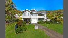  2/44 Wagstaffe Ave Wagstaffe NSW 2257 MOVE IN FOR CHRISTMAS This desirable property has water views and the perfect north east aspect. It is only a stroll to the waterfront, ferry and Wagstaffe shop. Previously a very popular holiday retreat. Renovated in 2013 and presents in pristine condition, just unpack and enjoy.  Split level living at it's best. The upper level offers a large open plan living area with high ceilings offers a combination of natural light and space, complimented by timber floors to create warmth. The functional galley style kitchen has granite bench tops and plenty of storage. Sliding glass doors flow onto a sunny deck with water views. A spacious main bedroom with ensuite, walk in robe and built-in window seat/storage. Only a few steps down to the additional bedrooms, both with built-in wardrobes, bathroom and separate toilet. Then laundry and small fenced yard. All this and a large single garage with additional space and storage - you could even accommodate a small boat. Perfect for holidays, investment or permanent living. 