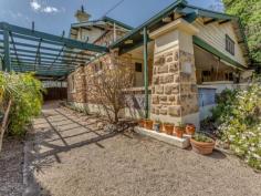  77 Fisher St Fullarton SA 5063 $695,000 - $725,000 Sit on the wonderful wide front verandah & watch the children play in the completely private front garden, exquisite character features, 4 bedrooms, 2 modern bathrooms, polished jarrah & Baltic floors, sitting room with open fire, formal dining room with box bay window, neat kitchen overlooks the family room, double carport with automatic door  - Ornate lofty ceilings  - Reverse cycle air conditioner – split system  - Gas heater  - Large gas stove ‘la Germania’  - Pantry  - Leadlight  - Open fireplaces  Secluded behind a high hedge & walking distance to good schools, shopping & transport, this home represents great value to get into the area. 