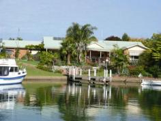  2/55 Wellington Street Paynesville VIC 3880 STUNNING HOME ON THE CANALSHere is a fantastic opportunity to buy a top quality home on the canals in a close-in locale with a jetty berth. Views of the canals from most rooms, Jarrah kitchen with timber bench tops, electric cooking, dishwasher, two living rooms, high ceilings, slate floors, natural gas log fire, ornate cornices, three bedrooms, master with WIR and ensuite, large laundry, split system, quality drapes and carpets, triple garage with auto door, private deck and north facing verandah for outdoor entertaining, power grid, van port and established landscaped gardens. Start your new lifestyle today. 