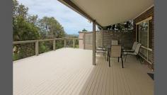 15 The Bridge Manyana NSW 2539 IMMPECAPABLE PRESENTATION Beautiful 3-4 bedroom two storey brick and tile residence + huge 7X3 metres rumpus now on offer for sale. Massive front verandah with privacy and views to ocean and distant Ulladulla. Double drive-in garage (drive thru single only). Full concrete driveway. Recent renovation includes extensively modernized front and rear deck. Open easy maintained level backyard. Superbly appointed U shaped kitchen with quality fittings. The open plan upstairs gives the area a multitude of uses along with sliding doors which open on to the decks for outdoor entertaining. You could be forgiven for thinking you were the only people in the surburb. A very quiet neighbourhood with the comforting sounds of the surf nearby. You'll really kick yourself if you miss this one on the Manyana headland position. 