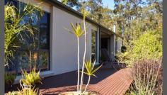 6 Burri Palm Way Surfside NSW 2536 The Perfect Coastal Setting This fabulous family home on 1 1/4 acres is nestled into a beautiful natural setting with abundant wildlife, enjoying an outlook from every window. - Offering four large bedrooms, master with walk-in robe and ensuite. - The main bedroom is secluded to one side of the home for complete privacy. - Expansive living areas, Formal lounge and separate dining. - Entertainer's kitchen with gas cooking, overlooking the huge deck. - Other features include ultra modern bathrooms, wood fire heater and much more. - Boasting beautiful landscaped gardens plus a huge deck with elevated views over the property. - Low maintenance grounds leaving you options for additions. If you are looking for small acreage close to town offering complete privacy, look no further make the time to see this one today! 