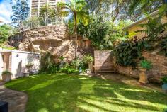  2/8 Marathon Road Darling Point NSW 2027 A true gem and a rare find. This exquisite three bedroom north facing luxury strata apartment sits above Double Bay's waterfront Steyne Park and looks straight up the Harbour to the Heads. There are three bedrooms, two bathrooms (one en-suite), a gleaming fully equipped, black marble-top kitchen and separate laundry. The dining room and lounge each have spectacular Harbour views and direct garden access via full length sliding glass doors. The manicured garden is both impressive in it's size and the fact that it has both harbour views and overlooks the secluded swimming pool below. The building is quietly tucked away among trees on the border of, and with direct walking access to, Double Bay, just a few minutes stroll to cafes, shopping and the Harbour Ferry. There is ample adjacent visitor parking and not one stair at all when accessing the unit through the double auto-door garage. This is an exceptional property in an exclusive well run building of only ten units. The unit itself is over 110 square metres in size and more than 300 square metres all up. Approved for further extension and air conditioning if required. Enter from Marathon Road, keep to the right and take the right hand driveway down to the visitor parking at the building. 