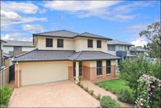  24 Woolls Crescent Ropes Crossing NSW 2760 Price Guide Over $614,950 You will be impressed with the quality fittings, floor plan, features and feel of this much loved and looked after family home. Located in a convenient spot within close proximity to Ropes Crossing Town Centre, train station, local schools and bus stop, this home has a long list of features for your consideration: + Great outlook with the park across the road + Formal lounge with plantation shutters + Informal dining and large living area off the kitchen + Gourmet kitchen with 900mm stainless steel gas cook, dishwasher, Large bench top and breakfast bar 