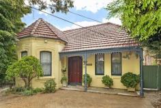  342 New Canterbury Rd Dulwich Hill NSW 2203 Rare opportunity to acquire a magnificent home with loads of character, 
appeal, space and comfort. Set back from the street behind a large 
established hedge De Rose is a beautiful grand double fronted 
freestanding home occupying a prominent position upon a 424sqm level 
block in the heart of Dulwich Hill. Enter via a traditional entrance 
hallway with breathtakingly high ceilings and ornate original features 
inclusive of leadlighting, marble fireplaces, french cedar doors, timber
 floorboards, bay windows, and intricate lacework. It is a property that
 has been meticulously maintained with an obvious attention to detail 
paid to any updates or restoration. The spacious single level layout 
includes two generously sized double bedrooms (one with built in 
wardrobe and both with ceiling fans) opposite traditional stunning 
double formal reception rooms for lounge and dining. The beautifully 
appointed new kitchen boasts abundant storage, caesar stone benches, 
quality appliances and a skylight feature, leading to a lovely 
sunroom/laundry with bay windows encompassing a tranquil leafy outlook 
with paved entertainment area. The naturally light-filled main bathroom 