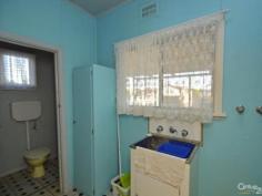  191 Pell St Broken Hill NSW 2880 CONVENIENT TO SHOPPING CENTRES Situated within easy reach of the Plaza this home is on an easy care block with front vehicle access.  There is a wide entrance hallway with lounge room, bedroom and kitchen/dine. Rear porch, bathroom, separate toilet and laundry.  