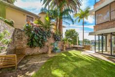  2/8 Marathon Road Darling Point NSW 2027 A true gem and a rare find. This exquisite three bedroom north facing luxury strata apartment sits above Double Bay's waterfront Steyne Park and looks straight up the Harbour to the Heads. There are three bedrooms, two bathrooms (one en-suite), a gleaming fully equipped, black marble-top kitchen and separate laundry. The dining room and lounge each have spectacular Harbour views and direct garden access via full length sliding glass doors. The manicured garden is both impressive in it's size and the fact that it has both harbour views and overlooks the secluded swimming pool below. The building is quietly tucked away among trees on the border of, and with direct walking access to, Double Bay, just a few minutes stroll to cafes, shopping and the Harbour Ferry. There is ample adjacent visitor parking and not one stair at all when accessing the unit through the double auto-door garage. This is an exceptional property in an exclusive well run building of only ten units. The unit itself is over 110 square metres in size and more than 300 square metres all up. Approved for further extension and air conditioning if required. Enter from Marathon Road, keep to the right and take the right hand driveway down to the visitor parking at the building. 