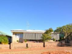  475 Cummins St Broken Hill NSW 2880 EXCELLENT NORTH LOCATION Ideally located to schools and Aquatic Centre this family home is on an elevated site. The home offers three bedrooms with built in robes plus an office. There is a well-appointed stylish kitchen with adjacent dining area which leads through to the lounge room. Centrally located bathroom includes Bath and shower recess, internal laundry and toilet.  Low Maintenance grounds with rear vehicle access, garage and carport.  