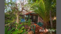 15 Pacific Cres Maianbar NSW 2230 Waterfront With Views To Soothe The Soul This warm and relaxed home hidden amongst tropical gardens enjoys an ever-changing panorama of the sea, sand and sky as boats pass by in the bay. Watch the surfers in the bay, boats sailing by and the local ferry chug its way to Cronulla Only an hour from the CBD, the unspoilt village of Maianbar feels worlds away. Surrounded by natural bushland and the perfectly clear blue waters of the bay, bushwalking, boating, fishing and swimming are all on your doorstep. Swim directly from your own back yard. And there's nothing like that top-of-the-world feeling when your guests admire those fabulous views. The view is outstanding. Features: Large entertaining deck with magnificent views 4 bedrooms and 2 bathrooms 2 living areas Direct water access Lush gardens and undercover entertaining area, there's plenty of room for your family and guests to share the idyllic atmosphere. Upstairs, the main lounge stretches out to a sunny deck with expansive views. Downstairs, another living room gazes out past the undercover entertaining area through palm leaves to the water. On the lower level, there's room to keep your kayaks and paddle boards safely undercover, or consider enclosing the space to create a granny flat, home office, or further guest accommodation. Throw in a generous fireplace, floorboards, easy-care slate tiles, courtyard and leafy gardens, and you've got a property well worth considering as a weekender or family home. All it needs is your own personal touch. 