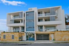  14/2-20 Gumara Street Randwick NSW 2031 A stylish fusion of cutting-edge architecture and sophisticated design, this sleek designer apartment is set in the exclusive boutique 'Serene'. Set at the end of a quiet cul-de-sac adjoining parkland, it features : * Study/rumpus area * Sleek Kitchen with Caesar stone bench tops, gas appliances + dishwasher * One bedroom with built in wardrobe * Entertaining balcony * Internal laundry * Air Conditioning * Direct Lift Access * One Security Car Space Just 1.5km to Coogee Beach, it's walking distance to The Spot's alfresco cafés and Ritz theatre!! 