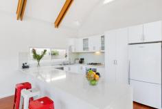  39 Makim St North Curl Curl NSW 2099 This is a family beachside classic two storey timber home. Set on a private 462 sqm – this street is fast becoming recognised for its peaceful demeanour, small reserve, and height offering water and district views. * Private from the street with established front hedges, delightful and sundrenched front sitting porch * Enormous family room with lounge and dining with a view through to the backyard * Open plan kitchen with gas cooking, stone island bench top with breakfast bar seating * High vaulted ceilings and second lounge area opening to the entertaining and BBQ with alfresco dining space * Four bedrooms all generous in size – the master offering water views and personal balcony * An amazing secret playroom/ or storage off the second bedroom * Modern bathrooms, rich hardwood timber flooring throughout * Swim spa and very private backyard, ample storage * Ducted reverse cycle a/c plus wall mounted split system A family favourite with the backyard and swim spa being able to be viewed from the kitchen and lounge areas. Close to primary and secondary school, local shops, reserves and playing fields. Size 462m² approx. 