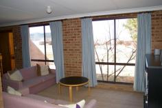  7/9 Berrivilla Close Berridale NSW 2628 Furnished 2 bedroom Townhouse Unit with garage In a nice quiet street away from the hustle and bustle of Berridale is this well presented, solid 2 bedroom unit in a block of 3. The unit consists of 2 bedrooms upstairs with a nice north facing balcony, a bathroom with shower, an internal laundry and a separate toilet. Downstairs is the open plan, lounge, dining room and kitchen. There is storage room under the stairs and a garage with an extra car parking space at the rear of the building. The units are well built in red brick. They present excellent value as an investment property or first time buyer. For more information or to make a booking, please call Patrick on 0411 136 645   Price  $129,000  Land Size  184 m2 