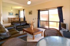 4/24 Pollack Esp Woolgoolga NSW 2456 $620,000 This immaculate apartment is located on the very popular Woolgoolga headland, where you can indulge in the uninterrupted views of our magnificent coastline. A truly prime position. The Mediterranean inspired residence oozes style and sophistication. Boasting 2 oversized bedrooms both with built-ins. The main offers its own bathroom with built-in linen press. The well appointed kitchen is the hub of the apartment & offers plentiful cupboard and bench space, built tastefully with cedar cabinetry. The informal meals area offers relaxed dining and there is additional living off the kitchen. Generous sunken lounge room offers the most amazing ocean views. Glass sliders lead out to a wrap around balcony ideal for entertaining friends and capturing those cool northerly breezes.  The expansive main bathroom features beautiful cedar cupboards. Absolutely no expense has been spared with this apartment boasting reverse cycle air conditioning, detached SLUG and internal laundry. All this within a 2 minute walk to the happening township Woolgoolga that offers a variety of award winning restaurants, alfresco cafes and clubs. Enjoy a Sunday morning breakfast after a refreshing dip in our fully patrolled beach. Woolgoolga has everything you could want and more when it comes to lifestyle.  Property: 	 Apartment Bedrooms: 	 2 Bathrooms: 	 2 Parking: 	 1 Rooms: 	 Family Room Local Amenities: 	 Schools Community Centre Bus Service Shops Sports Field & Club Nursing Home Child Care Centre Playground Park Council: 	 Coffs Harbour 