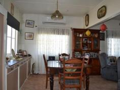  14 Porter Street Gayndah Qld 4625 $209,000 Not Just a Pretty Face * Solid 3 bedroom home on a spacious 1679m2 - * Returning $250 p/w partly furnished * Freshly painted kitchen with gas stove & pantry - lots of cupboard space * Two bathrooms * Cladded Exterior * New curved driveway with feature garden * 1 bay lock up garage, 6x6 shed, 3x3 lawn locker + carport  * New rev cycle A/C in living area + plenty of windows to let the breeze in * Rain water tanks * Established trees and gardens * Option to buy fully furnished   Property Snapshot  Property Type: House Land Area: 1,679 m2 