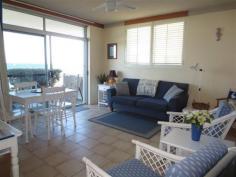  6/1 Queen St Yamba NSW 2464 SPECTACULAR POSITION, PHENOMENAL OCEAN VIEWS This is it, this is the property you’ve been dreaming of, don’t look anywhere else. Where else can you find a position right on the headland, taking in wonderful views of the Pacific Ocean, Main Beach and Convent Beach. Situated on the lower level for easy access, with access to the open grassed lawn area, off your patio, a great spot to relax and soak in the views. Properties in this position aren’t offered for sale every day. Act now to secure this opportunity. Are you looking for a relaxed beach lifestyle, a part-time holiday home or an investment. Yamba is known as Australia’s number 1 holiday destination. Offering beautiful beaches, access to the Clarence River and the lush National Park surrounds, and a charming small-town atmosphere, you could not ask for more in a holiday setting. The well known Craigmore building is beloved to it’s many visitors, and has been a popular holiday spot for many years. The building underwent a renovation in the last few years, with rendering and painting providing a modern façade. The position and of course the views will continue to attract the regular holiday clientele, making this a smart choice for investment. Being sold with the ability to continue holiday letting; this fully equipped unit is decorated in a cool coastal colour scheme. The easy care sand coloured tiled floors throughout the living areas in combination with the blue feature walls and carpeted bedrooms, captures the colours of the seaside environment. This unit offers a lighter and brighter atmosphere than most units, due to its position at the end of the building, and additional windows in the lounge and kitchen. Sliding glass doors from the living room lead to the front patio and beyond to the fenced lawn area. The galley style kitchen is original, however in good condition, with plenty of storage space. Offering two bedrooms, both with built-in robes and ceiling fans, and a combined bathroom and laundry, with shower, vanity, loo, laundry tub, overhead cupboards, washing machine and dryer. Car accommodation is provided with single carport, park the car and walk to the beach, cafes, restaurants, entertainment venues and shops from this location. Property: 	 Unit Bedrooms: 	 2 Bathrooms: 	 1 Parking: 	 1 Rooms: 	 Lounge/Living Local Amenities: 	 Shops Sports Field & Club Park Zoning: 	 SP3 Tourist Council: 	 Lot 6 SP 4356 