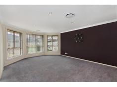  62 Bainbridge Cres Rooty Hill NSW 2766 Stop Looking, You've Found The One! $650,000-$670,000  Wiseberry St Marys are very proud to introduce this perfect four bedroom, two bathroom, brick home situated within a very house proud street within Rooty Hill. The property features a gorgeous colour palette throughout, tiles and carpet, downlights, ducted air con, security alarm, lock up garage with internal access, built-ins to all rooms with an ensuite and walk in to main, ceiling fans, manicured gardens, two large living areas, beautiful large modern kitchen with plenty of storage space and breakfast bar, stunning outdoor entertaining area with covered and uncovered areas and a built-in brick BBQ area. Situated in a perfect location within a great street, close to Mount Druitt Train Station, Westfields, schools, tafe, church, reserve, local shops, Great Western Highway and more!   Property Features: 1 Building4 Bedroom2 Bathroom1 EnsuiteBrick Veener Construction1 Parking500m2 Land Size 