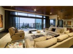  4601/323 Bayview Street Runaway Bay Qld 4216 $2,125,000 PENTHOUSE - Single Level with Marina Berth & 3 Carparks Don't miss the opportunity to own a rare single level open plan PENTHOUSE with a 15 metre marina berth with deep water access and low body corporate. Complete privacy, good security and world class facilities. Have the open Broadwater at your door step.  Spectacular 345sqm penthouse featuring: * 3 car side by side  * Huge lockable storage  * Dedicated media room  * Stunning water views  * Ultra modern, open plan living  * High timber ceilings * Large balcony with views for entertaining  * Beautiful Travertine floors * Chef's kitchen with Miele appliances * Space and light  * 15 metre marina berth with deep water access World class facilites featuring 3 swimming pools including a 25m heated lap pool, gymnasium, full size tennis court, recreational club and walking tracks. Close to cafes and shops. ...the list goes on.... an inspection is a must if you are looking for a low maintenance quality Penthouse. Look forward to showing you through.   Property Snapshot  Property Type: Penthouse Aspect Views: East to Broadwater Views Features: Alarm Balcony Built-In-Robes Close to schools Close to Transport Dishwasher Ensuite Formal Dining Room Furnished Granite Benches Gym In-Ground Pool Lounge Outdoor Living Pool Storage Study Undercover Entertainment Area Walk-In-Robes Waterview 