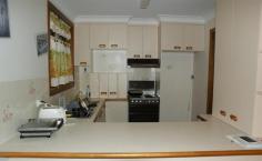  1 & 2/17 Tomkins Ave Woolgoolga NSW 2456 $529,000 PRICE REDUCTION FOR 2 GREAT VILLA'S Fantastic opportunity to own 2 villas is even more attractive with this great price reduction. Whether you buy them for an investment or live in one and rent the other out, the choices are endless. Sitting in an elevated postion overlooking a quiet cul de sac. Ideally located close to town. Great long term tenants. Villa 1: Open plan kitchen with plenty of cupboard space. Generous open plan dining and lounge, fitted with reverse cycle air conditioning. 3 bedrooms, built-in to the spacious main. Spacious bathroom, separate laundry. Undercover entertaining area offers access to the single lock up remote control garage. Small yard makes for easy maintenance. Villa 2: Well appointed kitchen with plenty of cupboard space, electric oven, breakfast bar combined dining and good size lounge room, fitted with reverse cycle air con. 3 bedrooms all with built-ins.  Internal laundry offering access to the outdoor screened enclosure & also access to single lock up remote control garage. Villa 2 has a large yard with water tank and garden shed. Situated on the high side of the street overlooking the cul de sac. Both villas are clean and tidy inside and are in great condition. Just rent it out and forget. No Strata Fees as these great villas are on the one title. The nearby creek provides pedestrian access to town via a footbrige and a tranquil location for kayaking. Age of property:1989 Property: 	 Villa Bedrooms: 	 6 Bathrooms: 	 2 Parking: 	 2 Land Size: 	 779.5 Sqm Council: 	 Coffs Harbour 