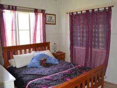  14 Porter Street Gayndah Qld 4625 $209,000 Not Just a Pretty Face * Solid 3 bedroom home on a spacious 1679m2 - * Returning $250 p/w partly furnished * Freshly painted kitchen with gas stove & pantry - lots of cupboard space * Two bathrooms * Cladded Exterior * New curved driveway with feature garden * 1 bay lock up garage, 6x6 shed, 3x3 lawn locker + carport  * New rev cycle A/C in living area + plenty of windows to let the breeze in * Rain water tanks * Established trees and gardens * Option to buy fully furnished   Property Snapshot  Property Type: House Land Area: 1,679 m2 