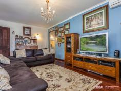  2 Ann St Kallangur QLD 4503 DETAILS ID #: 0000246055 Price: $389,000 Type: House Bed: 3    Bath: 1     Land Area: 800 sqm (approx) COLONIAL STYLE ON CENTRAL 800M2 CORNER Highly prized and rarely found attractive home with beautiful timber windows, French doors and hardwood floors. The verandah's are over 10m long on 2 sides and displays the colonial characteristics that are so popular. Here you'll find a separate lounge room and large family size dining. The home has comfortable air conditioning through-out. This galley style kitchen has a smooth 2pac finish with good storage, dishwasher, modern oven, flat cook tops and large fridge space. The bedrooms are a traditional good size with built-ins or cupboards. There's a matching style building beside the house with power and water connected which could be easily used as a 4th guest room/ teenage retreat. The land itself is prime for development application with 29m and 22m (approx) front boundaries. The home is built on stumps making it possible to reposition on the current block or relocate onto other land. Rarely found beautifully presented comfortable property to live in, with convenience to everything, and real options to secure your future. 