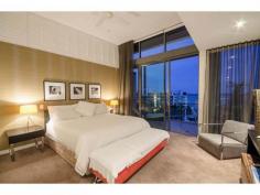  4601/323 Bayview Street Runaway Bay Qld 4216 $2,125,000 PENTHOUSE - Single Level with Marina Berth & 3 Carparks Don't miss the opportunity to own a rare single level open plan PENTHOUSE with a 15 metre marina berth with deep water access and low body corporate. Complete privacy, good security and world class facilities. Have the open Broadwater at your door step.  Spectacular 345sqm penthouse featuring: * 3 car side by side  * Huge lockable storage  * Dedicated media room  * Stunning water views  * Ultra modern, open plan living  * High timber ceilings * Large balcony with views for entertaining  * Beautiful Travertine floors * Chef's kitchen with Miele appliances * Space and light  * 15 metre marina berth with deep water access World class facilites featuring 3 swimming pools including a 25m heated lap pool, gymnasium, full size tennis court, recreational club and walking tracks. Close to cafes and shops. ...the list goes on.... an inspection is a must if you are looking for a low maintenance quality Penthouse. Look forward to showing you through.   Property Snapshot  Property Type: Penthouse Aspect Views: East to Broadwater Views Features: Alarm Balcony Built-In-Robes Close to schools Close to Transport Dishwasher Ensuite Formal Dining Room Furnished Granite Benches Gym In-Ground Pool Lounge Outdoor Living Pool Storage Study Undercover Entertainment Area Walk-In-Robes Waterview 
