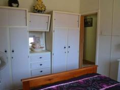  14 Porter Street Gayndah Qld 4625 $209,000 Not Just a Pretty Face * Solid 3 bedroom home on a spacious 1679m2 - * Returning $250 p/w partly furnished * Freshly painted kitchen with gas stove & pantry - lots of cupboard space * Two bathrooms * Cladded Exterior * New curved driveway with feature garden * 1 bay lock up garage, 6x6 shed, 3x3 lawn locker + carport  * New rev cycle A/C in living area + plenty of windows to let the breeze in * Rain water tanks * Established trees and gardens * Option to buy fully furnished   Property Snapshot  Property Type: House Land Area: 1,679 m2 