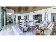  4601/323 Bayview Street Runaway Bay Qld 4216 $2,125,000 PENTHOUSE - Single Level with Marina Berth & 3 Carparks Don't miss the opportunity to own a rare single level open plan PENTHOUSE with a 15 metre marina berth with deep water access and low body corporate. Complete privacy, good security and world class facilities. Have the open Broadwater at your door step.  Spectacular 345sqm penthouse featuring: * 3 car side by side  * Huge lockable storage  * Dedicated media room  * Stunning water views  * Ultra modern, open plan living  * High timber ceilings * Large balcony with views for entertaining  * Beautiful Travertine floors * Chef's kitchen with Miele appliances * Space and light  * 15 metre marina berth with deep water access World class facilites featuring 3 swimming pools including a 25m heated lap pool, gymnasium, full size tennis court, recreational club and walking tracks. Close to cafes and shops. ...the list goes on.... an inspection is a must if you are looking for a low maintenance quality Penthouse. Look forward to showing you through.   Property Snapshot  Property Type: Penthouse Aspect Views: East to Broadwater Views Features: Alarm Balcony Built-In-Robes Close to schools Close to Transport Dishwasher Ensuite Formal Dining Room Furnished Granite Benches Gym In-Ground Pool Lounge Outdoor Living Pool Storage Study Undercover Entertainment Area Walk-In-Robes Waterview 