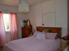  14 Porter Street Gayndah Qld 4625 $209,000 Not Just a Pretty Face * Solid 3 bedroom home on a spacious 1679m2 - * Returning $250 p/w partly furnished * Freshly painted kitchen with gas stove & pantry - lots of cupboard space * Two bathrooms * Cladded Exterior * New curved driveway with feature garden * 1 bay lock up garage, 6x6 shed, 3x3 lawn locker + carport  * New rev cycle A/C in living area + plenty of windows to let the breeze in * Rain water tanks * Established trees and gardens * Option to buy fully furnished   Property Snapshot  Property Type: House Land Area: 1,679 m2 