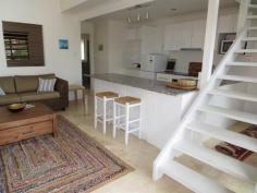  1/11-13 The Crescent - Angourie NSW 2464  $369,000 LIVE THE DREAM IN ANGOURIE Have you always dreamt of a carefree lifestyle near the ocean, well here is your chance to make it a reality without breaking the bank. Enjoy morning strolls along Spooky beach then grab some breakfast at the Angourie store, both within a few minutes walk from your front door. This unit has been completely renovated inside out so there’s nothing to do but move in and relax. Open plan lounge/dining with contemporary all white two pac kitchen which leads onto a large north facing timber deck. The deck enjoys ocean glimpse plus is ideal for entertaining or catching an ocean breeze. There is main bedroom downstairs plus second loft bedroom upstairs both serviced by an ultra modern stylish bathroom. This unit also offers laundry facilities within plus single carport. Ideal for astute investor or embrace all Angourie has to offer with this modern 2 bedroom unit. Property: 	 Unit Bedrooms: 	 2 Bathrooms: 	 1 Parking: 	 1 Council: 	 Lot 4 SP 67003 