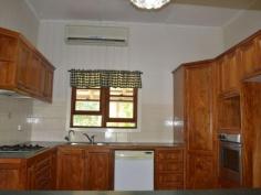  22 Meson Street Gayndah Qld 4625 $275,000 Beautifully Restored Queenslander - Entertainers Delight * 4 good sized bedrooms - 2 with walk in dressing rooms * Returning $285 p/w on a long term lease * Beautiful timber kitchen with ample bench space, dishwasher, gas cooktop + servery * Huge entertaining deck overlooking the back yard * Bathroom features shower over bath & linen cupboard * Polished wooden floors in lounge & front entry room * 3 reverse cycle A/C + ceiling fans * Large 1,363m2 allotment - plenty of room to watch the kids play from the back deck * Centrally located - stone throw away from schools and shops   Property Snapshot  Property Type: House Land Area: 1,363 m2 