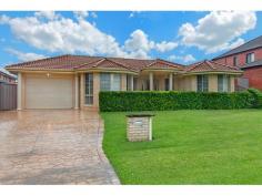  62 Bainbridge Cres Rooty Hill NSW 2766 Stop Looking, You've Found The One! $650,000-$670,000  Wiseberry St Marys are very proud to introduce this perfect four bedroom, two bathroom, brick home situated within a very house proud street within Rooty Hill. The property features a gorgeous colour palette throughout, tiles and carpet, downlights, ducted air con, security alarm, lock up garage with internal access, built-ins to all rooms with an ensuite and walk in to main, ceiling fans, manicured gardens, two large living areas, beautiful large modern kitchen with plenty of storage space and breakfast bar, stunning outdoor entertaining area with covered and uncovered areas and a built-in brick BBQ area. Situated in a perfect location within a great street, close to Mount Druitt Train Station, Westfields, schools, tafe, church, reserve, local shops, Great Western Highway and more!   Property Features: 1 Building4 Bedroom2 Bathroom1 EnsuiteBrick Veener Construction1 Parking500m2 Land Size 