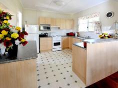  6 Cedar St Cannon Hill QLD 4170 Offers Over $570,000 QUAINT POST WAR COTTAGE, WITH LEGAL HEIGHT POTENTIAL UNDERNEATH ! What a unique opportunity! This 3bedroom Post war home has loads charm, quaint gardens, and lovely views off the deck at the rear. The added bonus is that the house has been lifted to legal height and there are internal stairs, so if you wish to make use of the space downstairs the potential is there! Explain some more you say! *3 generous size bedrooms with ceiling fans and timber floors *Main bathroom comes complete with separate toilet. Even a bath for those who like to have a soak *Open plan living with lovely timber floors, formal lounge / dining and access to the rear deck through the slide doors *Air conditioned living , plus ceiling fans *Modern kitchen with loads of storage space and plenty of bench space for the chef to spread out. *Rear deck with roof line cover with lovely views back over Cannon Hill and the CHAC sports fields *Double lockup garage with remote access and internal access. *Plenty of storage space underneath the house - or use the potential to build *Lovely gardens with plenty of space in the rear for you to create areas for the children, pools or what ever your heart desires. *Currently tenanted until March 2015. Rent $440.00 per week *Easy stroll to CHAC College, trains, buses. Only minutes to shops and many other schools The potential is amazing and the current home will just charm! View to appreciate what is on offer. Offers over $570,000.00   Property Snapshot  Property Type: House Land Area: 405 m2 Features: Deck 