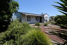  15-21 Cox Street Yerong Creek NSW 2642 FROM $90,000 Together or separately these properties have fantastic potential. Comprising four titles of equal size, the three bedroom cottage is on one acre of land and two titles, and a 10m x 20m shed, adjacent to the Olympic Highway, is on the remaining two titles on one acre of land. This property can be sold as one whole or in two parts. In the heart of Yerong Creek, next to the Primary School and adjacent to the Olympic Highway, 30 minutes from Wagga Wagga this land could be further subdivided or the existing 4 titles could be used for further development. The existing configuration is exciting enough with a neat and sound three bedroom fibro having a rent projection of between $180 and $200 per week. The existing 10X20m shed fronting the highway is suitable for a multitude of uses. This site has a long history of selling cars and sundry items and is suitable for craft market, coffee or any business needing highway frontage.  * 	 3 bedroom cottage on 1 acre (2 titles) - $135,000 * 	 Large shed on 1 acre (2 titles) - $90,000 * 	 Sold as a whole (4 titles) - Price by negotiation Property Features Property ID 	 Yerongcreekcox15-21 Bedrooms 	 3 Bathrooms 	 1 Garage 	 2 Close to 	 Next to Primary School, adjacent Olympic Highway Land Size 	 2 Acre approx. Rental Return 	 $180 Weekly Forecast Rates 	 $1044.29 Yearly 
