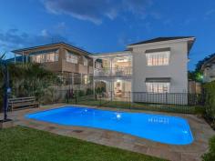  16 Merehaye St Wooloowin QLD 4030 The Inner City suburb of Wooloowin has long been a favourite with professionals and families simply by virtue of its location to the CBD and the delightful architecture that is lovingly preserved by house proud owners. 16 Merehaye Street Wooloowin is a perfect example of the retained Queenslander style of the 1930's coupled seamlessly with the modern edgy design to meet the demands of the family spread over 2 delightful levels. Simply, this home is delight in every respect. The owners have painstakingly restored and renovated this home creating a double level home of style and distinction, with multiple living areas, 5 bedrooms, 2 bathrooms, and 3 car accommodation all encapsulating the superb city views. The original home has been transformed with a renovation on the upper level starting at the kitchen and flowing throughout the entire home. The chefs kitchen is a delight. With timber cabinetry, stone benchtops, stainless steel European appliances, including 700wide gas cooktop and electric oven, dishwasher and rangehood, all central to the amazing full width servery that opens out to the covered deck with absolute city views. Adjacent to the deck are the informal meals area and lounge all atop beautiful solid timber floors, throughout the entire upper level. Also on this level are 4 bedrooms all generous in size and a superbly renovated family bathroom including freestanding bath, frameless glass shower, floor to ceiling tiles and quality and luxury in abundance, this is a delightful and relaxing space in keeping with the style of the home. On the lower level, accessed via a timber staircase, there is the Master Suite with ensuite, opening onto the rear yard and magnificent in ground pool and landscaped surrounds.  Also on this level is a fully tiled lounge/rumpus room or media room, a study or home office and direct access to the rear yard and pool and 3 car accommodation. Additionally the home has ducted airconditioning throughout the upper level, ceiling fans throughout the entire home, and attention to detail at every turn. This is truly a home to be proud of in an ideal location, walking distance to Wooloowin or Albion City Rail stations, public and private schools and just 6 kilometers to the centre of Brisbane. Upper Level 2 Bedrooms, built-ins, ceiling fans  2 Bedrooms, ceiling fans 1 Family bathroom Living area with access to balcony  Chef's Kitchen with timber cabinetry, stone benchtops, gas cooktop Dining area Lower Level  1 Master bedroom, ensuite, access to outdoor entertaining Office  Living area Laundry 30sm lockable storage area Outdoor entertaining area Swimming pool  Amazing city views 567m2 Block  Ducted air conditioning  Electric gates 3 Car accommodation Walking distance to public transport Close to shops  Close to schools 