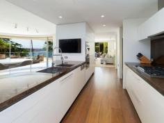  301/11 Esplanade Elizabeth Bay NSW 2011 DETAILS ID #: 0000247448 Price: Expressions of Interest Type: Apartment Bed: 5    Bath: 5    Car: 4 'Villa Caprera' - Whole Floor Palatial Luxury Opposite Park & Harbour Enjoying an ideal Northerly aspect and sublime views of waterfront Beare Park, the shimmering Harbour and NYE fireworks, this dream private oasis is the largest in an award-winning boutique security block of just 8. Architecturally inventive and glamorously appointed for contemporary easy living and entertaining with minimal upkeep, this vast indoor/outdoor apartment is perfect for downsizers or a young family. Masterbuilt and occupying an entire floor in a coveted harbourside cul-de-sac position, the apartment's sleek sophistication offers incredible versatility, absolute security and quiet privacy. A short walk to elite Elizabeth Bay marina, Rushcutters Bay tennis courts or high-fashion Potts Point shopping, dining and transport choices, this magnificent apartment is also just minutes to the CBD by water taxi.  * Level lift access directly into your private lobby and reception foyer  * 2 huge open plan living/dining rooms flow to 2 large alfresco terraces * Marble Miele Gaggenau gas gourmet kitchen, walk-in pantry, cocktail bar * 2 opulent master wings with marble ensuites, walk-in robes, terrace access * Separate study zone, 2 additional large bedrooms, 1 with marble ensuite * Large separate fully-equipped home theatre/rumpus room or 5th bedroom * Marble guest powder room, marble main bathroom, internal laundry room * High ceilings, abundant storage, sensor-lit wardrobes, motorised blinds  * Stone terraces, travertine or wide-planked timber floors, silk carpet in bedrooms * Ducted A/C (all rooms separately controlled), surround sound, no common walls * Motorised awnings, lush low-maintenance landscaping and vertical garden * 4-car security garage (internal access), comprehensive back-to-base alarm 