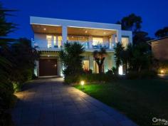  3 Solitude Dr Carrickalinga SA 5204 MAGNIFICENT HOME, SPECTACULAR SEA VIEWS , RELAX AND ENJOY! This property makes a big statement as soon as you arrive! Firstly the easy care landscaped garden has an impressive coastal feel and what strikes you next is the magnificent architecturally designed two storey home with expansive windows and clever use of building materials. In 2008 this property won the Master Builders Association (MBA) SA, Building Excellence Award and it's easy to understand why! Everything about the house and gardens of this property spells 'class'. Not to mention the spectacular 180 degree sea views of the beautiful Carrickalinga bay from the upper level.  This low maintenance luxury house built in 2007 by owner builder Proprietor of Prostruct Building Services is located in the highly sought after Carrickalinga North bay. A short stroll of less than 3 minutes will take you to one of the most beautiful pristine beaches in South Australia.  This is a great home for relaxing or for entertaining family and friends. Either way just enjoy the sea air and magnificent sea views from the large front deck or if it happens to be a bit chilly move to the sheltered rear deck or inside to the spacious open plan kitchen /family area that features lighting to suit any mood. The surround sound system allows you to kick back, relax and soak up your favourite music.  The lower and upper floors can be occupied as two completely separate residences which is great because it offers privacy when you have family and friends to stay. The four bedrooms, two up and two down all have built in robes and on each floor you have an Alby Turner kitchen, open plan living areas along with impressive contemporary bathrooms, one on the ground floor and two upstairs.  So many features tick the boxes:  - The short walk that will take you to a fantastic beach  - From the front foyer the architecturally designed stainless steel and spotted gum timber staircase linking the top and bottom floors  - The 12,000 litre underground water storage with filtration and Ultra-Violet purification system is plumbed to house and garden & Sprinkler system  - Separate RC ducted Air Conditioning on each level  - Laundry chute from upper floor to the large laundry below fitted with quality Miele appliances  - The extensive cupboards and storage space throughout – everything will have a place  - The fabulous Fleurieu location that gives access to the quaint Normanville village, trendy cafes, wineries and beautiful beaches – swim, surf, fish and enjoy the lifestyle.  Call Pauline Gum for more information 0427 700 056  