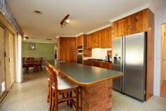  11 Dimbanna Court Lavington NSW 2641 340,000 WOW, 22sq's of living, 4 bedrooms plus a study offering excellent entertainment space inside & out. Positioned at the end of a quiet court, offering country views of Red light Hill, the home includes a 7.5m x 7.5m double lockup garage plus excellent side access if you have a boat or caravan to store. The current owners have created a 2 way bathroom off a bedroom and is wheelchair friendly. A teenage daughter would love it!  The home also features a formal lounge, 2nd living room, timber kitchen with gas cooktop, electric oven & dishwasher. The master bedroom includes a walk-in robe and of course, your own private bathroom. The home boasts ducted heating, ducted cooling, built-in robes throughout, a large covered outdoor entertainment area. To top it all off, 5kW of solar panels have been installed for energy efficiency in the home. The block is a good sized 787sq's with established gardens. The home is tucked away in an exclusive part of town with good access to schools, shops, a childcare facility, sporting field and transport. This home is a must to inspect.  Property Features Property ID 	 12112263 Bedrooms 	 4 Bathrooms 	 2 Main bathroom offers 2 way access from bedroom plus wheelchair friendly shower Garage 	 2 7.5m x 7.5m double lock-up garage Kitchen 	 Timber kitchen with gas cooktop, electric oven, dishwasher Lounge 	 Formal lounge, 2nd living room Front Yard 	 Side access, solar panels Back Yard 	 Large covered outdoor entertainment area Air Conditioning 	 Ducted heating & cooling Close to 	 schools, shops, childcare, sporting field, transpo Inclusions 	 Fixed floor coverings, curtains, blinds, light fittings, T.V antenna, dishwasher Land Size 	 787 Square Mtr approx. Rates 	 $1305.82 Yearly Built In Robes 	 Yes Dishwasher 	 Yes Ducted Cooling 	 Yes Ducted Heating 	 Yes Outdoor Ent 	 Yes Study 	 Yes 