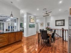  16 Merehaye St Wooloowin QLD 4030 The Inner City suburb of Wooloowin has long been a favourite with professionals and families simply by virtue of its location to the CBD and the delightful architecture that is lovingly preserved by house proud owners. 16 Merehaye Street Wooloowin is a perfect example of the retained Queenslander style of the 1930's coupled seamlessly with the modern edgy design to meet the demands of the family spread over 2 delightful levels. Simply, this home is delight in every respect. The owners have painstakingly restored and renovated this home creating a double level home of style and distinction, with multiple living areas, 5 bedrooms, 2 bathrooms, and 3 car accommodation all encapsulating the superb city views. The original home has been transformed with a renovation on the upper level starting at the kitchen and flowing throughout the entire home. The chefs kitchen is a delight. With timber cabinetry, stone benchtops, stainless steel European appliances, including 700wide gas cooktop and electric oven, dishwasher and rangehood, all central to the amazing full width servery that opens out to the covered deck with absolute city views. Adjacent to the deck are the informal meals area and lounge all atop beautiful solid timber floors, throughout the entire upper level. Also on this level are 4 bedrooms all generous in size and a superbly renovated family bathroom including freestanding bath, frameless glass shower, floor to ceiling tiles and quality and luxury in abundance, this is a delightful and relaxing space in keeping with the style of the home. On the lower level, accessed via a timber staircase, there is the Master Suite with ensuite, opening onto the rear yard and magnificent in ground pool and landscaped surrounds.  Also on this level is a fully tiled lounge/rumpus room or media room, a study or home office and direct access to the rear yard and pool and 3 car accommodation. Additionally the home has ducted airconditioning throughout the upper level, ceiling fans throughout the entire home, and attention to detail at every turn. This is truly a home to be proud of in an ideal location, walking distance to Wooloowin or Albion City Rail stations, public and private schools and just 6 kilometers to the centre of Brisbane. Upper Level 2 Bedrooms, built-ins, ceiling fans  2 Bedrooms, ceiling fans 1 Family bathroom Living area with access to balcony  Chef's Kitchen with timber cabinetry, stone benchtops, gas cooktop Dining area Lower Level  1 Master bedroom, ensuite, access to outdoor entertaining Office  Living area Laundry 30sm lockable storage area Outdoor entertaining area Swimming pool  Amazing city views 567m2 Block  Ducted air conditioning  Electric gates 3 Car accommodation Walking distance to public transport Close to shops  Close to schools 