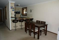  1 & 2/17 Tomkins Ave Woolgoolga NSW 2456 $529,000 PRICE REDUCTION FOR 2 GREAT VILLA'S Fantastic opportunity to own 2 villas is even more attractive with this great price reduction. Whether you buy them for an investment or live in one and rent the other out, the choices are endless. Sitting in an elevated postion overlooking a quiet cul de sac. Ideally located close to town. Great long term tenants. Villa 1: Open plan kitchen with plenty of cupboard space. Generous open plan dining and lounge, fitted with reverse cycle air conditioning. 3 bedrooms, built-in to the spacious main. Spacious bathroom, separate laundry. Undercover entertaining area offers access to the single lock up remote control garage. Small yard makes for easy maintenance. Villa 2: Well appointed kitchen with plenty of cupboard space, electric oven, breakfast bar combined dining and good size lounge room, fitted with reverse cycle air con. 3 bedrooms all with built-ins.  Internal laundry offering access to the outdoor screened enclosure & also access to single lock up remote control garage. Villa 2 has a large yard with water tank and garden shed. Situated on the high side of the street overlooking the cul de sac. Both villas are clean and tidy inside and are in great condition. Just rent it out and forget. No Strata Fees as these great villas are on the one title. The nearby creek provides pedestrian access to town via a footbrige and a tranquil location for kayaking. Age of property:1989 Property: 	 Villa Bedrooms: 	 6 Bathrooms: 	 2 Parking: 	 2 Land Size: 	 779.5 Sqm Council: 	 Coffs Harbour 
