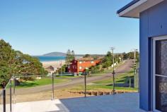 27B Stafford Street, Gerroa, NSW 2534 $820,000 This unique architecturally designed Torrens Title villa offers spacious modern living only a couple minutes' walk to Seven Mile Beach and Crooked River. Magnificent coastal views can be enjoyed from the large marble entertaining deck and open plan living room.  Brand new, this 3 bedroom villa boasts high quality fittings and finishes throughout with a modern chef's kitchen decked out with Smeg appliances and timber floorboards. There is nothing more to do, nothing more to spend, no strata fees on this seaside villa - call today and you could be living the coastal dream! 