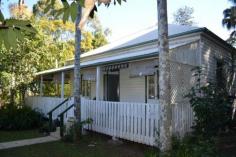  17-18 Dibbs St Coraki NSW 2471 $279,000 Grand Old Homestead Located on the outskirts of the township of Coraki and only 20 minutes both to Lismore or the sandy beaches  of Evans Head. The lovely old residence has many  original features and boasts french doors, open fire, high ceilings, timber floors, cool open verandahs on 2 sides and a renovated kitchen. This charming home is 100+ years old and is complimented  by 2428m2 of old world gardens. The land is covered by 2 titles, the second needing building entitlement. For those every day needs a short drive takes you to the  heart of the township for shopping and most other services. Property: 	 House Bedrooms: 	 3 Bathrooms: 	 1 Parking: 	 1 Zoning: 	 residential Council: 	 RICHMOND VALLEY 