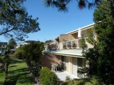 1/14 Surfview Avenue Hallidays Point NSW 2430 $339,000 Immaculate and affordable 2 bedroom unit in Black Head village only a short stroll to the beach. Open plan living area opening onto tiled veranda. Main bedroom has access to the bathroom. North facing to catch the north easterly sea breezes. Spacious and modern bathroom, large kitchen with dishwasher, lock up garage plus car space. Only 3 hours north of Sydney on the Mid North Coast centrally located between two large regional centres of Forster/Tuncurry and Taree. L/870 
