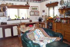  74 Walter St Balingup WA 6253 545,000 Property type: Acreage / Semi-Rural Suburb: Balingup (profile) Region: Southern Land area: 0 sqmCHARACTER AND CHARM This delightful 4 bedroom, 2 bathroom home, hidden on just over 4 acres, has warmth, character and a great feeling of homeliness. The welcoming country charm is apparent from the moment you enter through the front door, with it's beautiful leadlight insert and sidelights, to the little wooden steps leading up to the bedroom in the attic with panoramic views from the dormer windows. The home has a lovely cottage ambience, and is awaiting new custodians to enjoy it's character and charm. With many traditional features, the home has instant country appeal, yet has all the modern comforts of today. The farmhouse kitchen has terracotta style tiles, and a slow combustion stove to keep the home warm and cosy during cooler winter months. The lounge has beautiful views , ornate ceiling rose, and a welcoming brick fireplace.  Another entry in to the house is through a welcoming tiled foyer, leading into a studio with high ceilings and exposed wooden framework.  Established deciduous trees surround the house. In autumn and winter the leaves fall, allowing the light and warmth of the winter sun into the house. New leaves emerge in spring, and in summer the dappled light and canopy of the shady trees provide shelter for the cottage gardens and prolific bird life. Enjoy picking tree-ripened fruit from the assortment of fruit trees, and enjoy making pies or bottling fruit from the freshly-picked harvest.  Country living doesn't get much better than this! The property also has a large workshop/garage and has two large rain-water tanks. For more information, please call either John or Sue on 97641089 