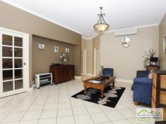  45 Seville Crest Mindarie WA 6030 For Sale $699,000 - $749,000 You can change anything in a house but you can never change the location and that is where this home screams great value. There is absolutely no need to change the size because this home is enormous. You have massive bedrooms, formal lounge/dining, separate games room, a study which could easily be the 5th bedroom and a more than spacious kitchen/meals all boasting high ceilings.  This property is located on one the loveliest streets, a very quiet and elevated spot on a good sized plot of land (680sqm) with plenty of room for a swimming pool if desired. The value of this property would rise dramatically with any sort of renovations because of the generous size and the location.  Here is a snap shot of the features:  Double Door Entry  Huge Lounge/Dining ideal to convert into a theatre and study  Five Bedrooms all more than adequate to accommodate Queen sized beds with the master being huge and framed by a bank of windows ? so pretty  Very generous ensuite and walk in robe separate WC, big bath and double sink vanity  Large open planned meals/family/kitchen  Extremely large kitchen allowing any budding chef to cook up a storm with wall oven and hot plate, stainless steel dishwasher and double fridge recess  Access from the double garage into the kitchen,  Separate Games Room or can be the theatre room  Sliding glass doors lead out to the patio from the meals area  Good sized patio with room at the back for the kids to play or install a pool in required  Split system air conditioners  Alarm System  Built approximately 1998  267 m2 (approx.) of home on a 680sqm block of land  Awesome location for quiet suburban living 